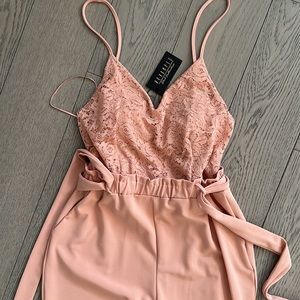 Summer romper. New with tag. Size M